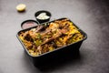 Online Food Delivery conceptÃÂ  - Gosht Pulao Or Mutton Biryani packed in Plastic box